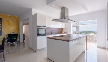 Resa estates Ibiza san Jose te koop villa main kitchen island.jpg